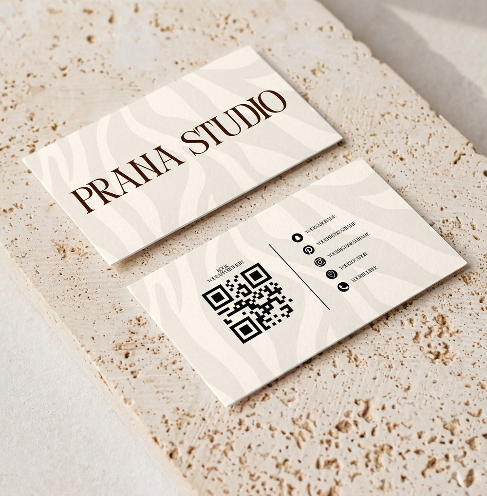 Editable loyalty card template for beauty professionals, Zebra Cream · QR & Socials design, front and back shown on travertine