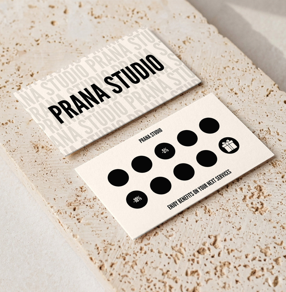 Editable loyalty card template for beauty professionals, Bold Black · Percentages & Gift design, front and back shown on travertine