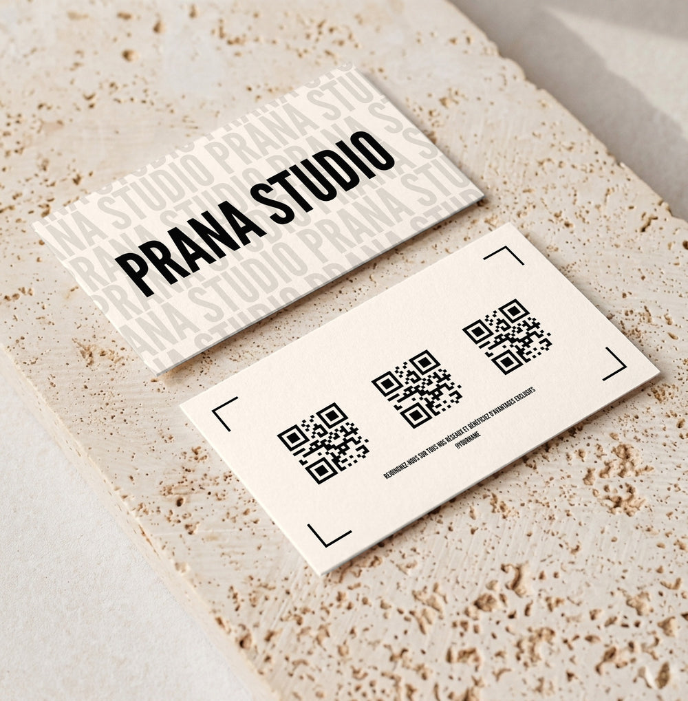 Editable loyalty card template for beauty professionals, Bold Black · Three QR Codes design, front and back shown on travertine